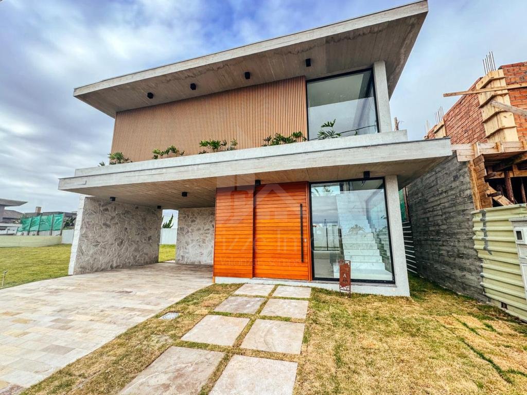 Casa em Condominio 4 dormitorios