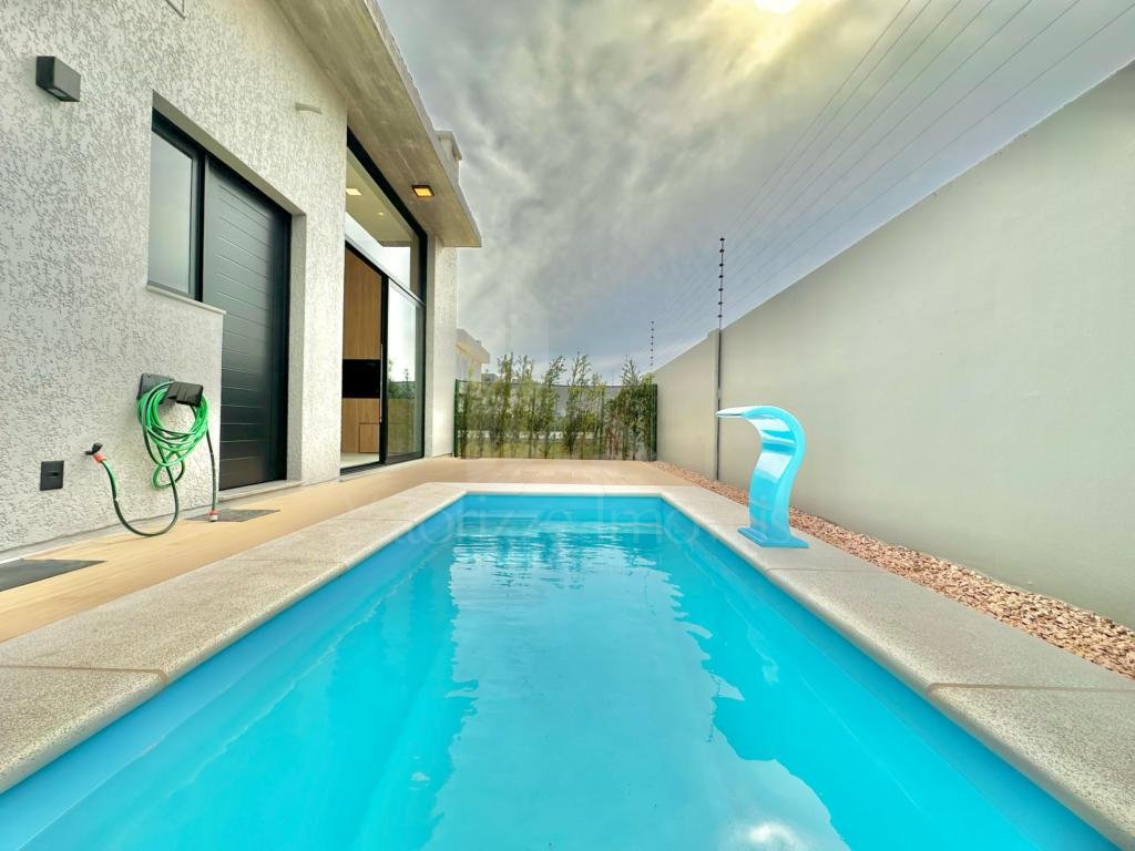 Casa em Condominio 4 dormitorios