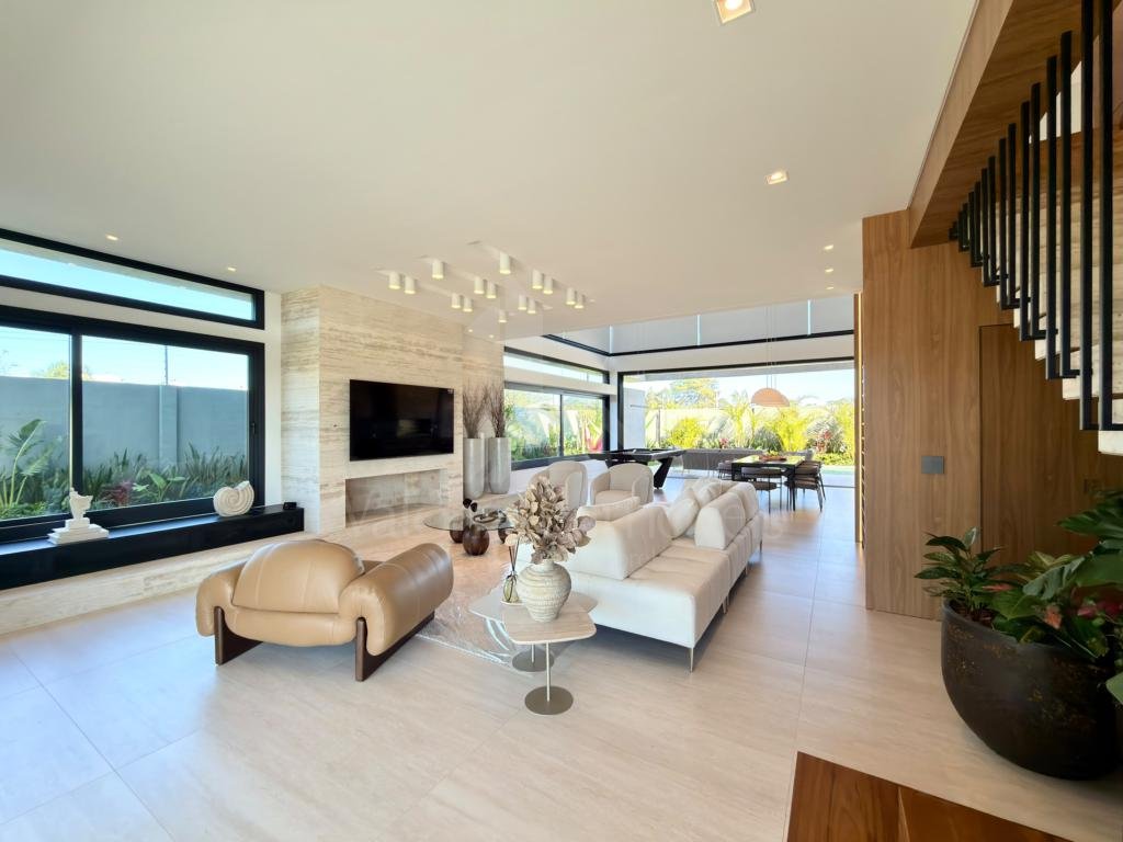 Casa em Condominio 5 dormitorios