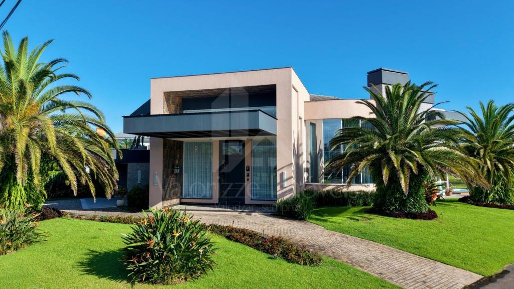 Casa em Condominio 5 dormitorios