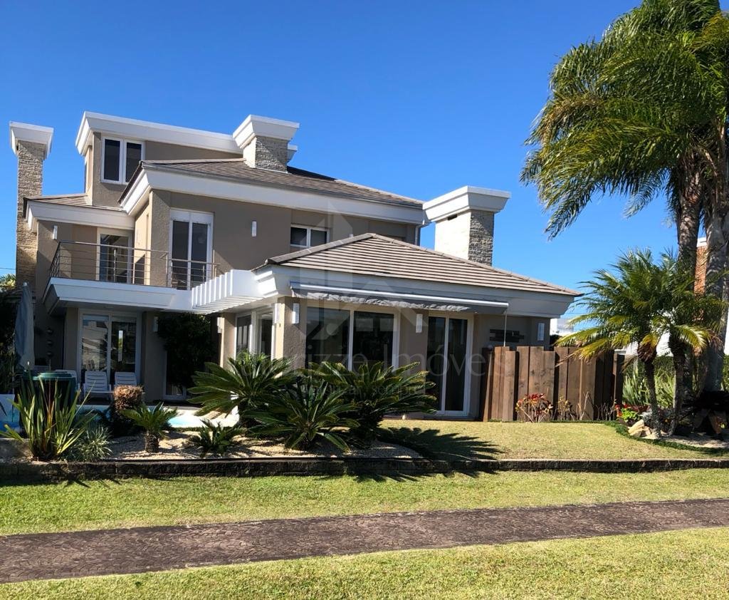 Casa em Condominio 5 dormitorios