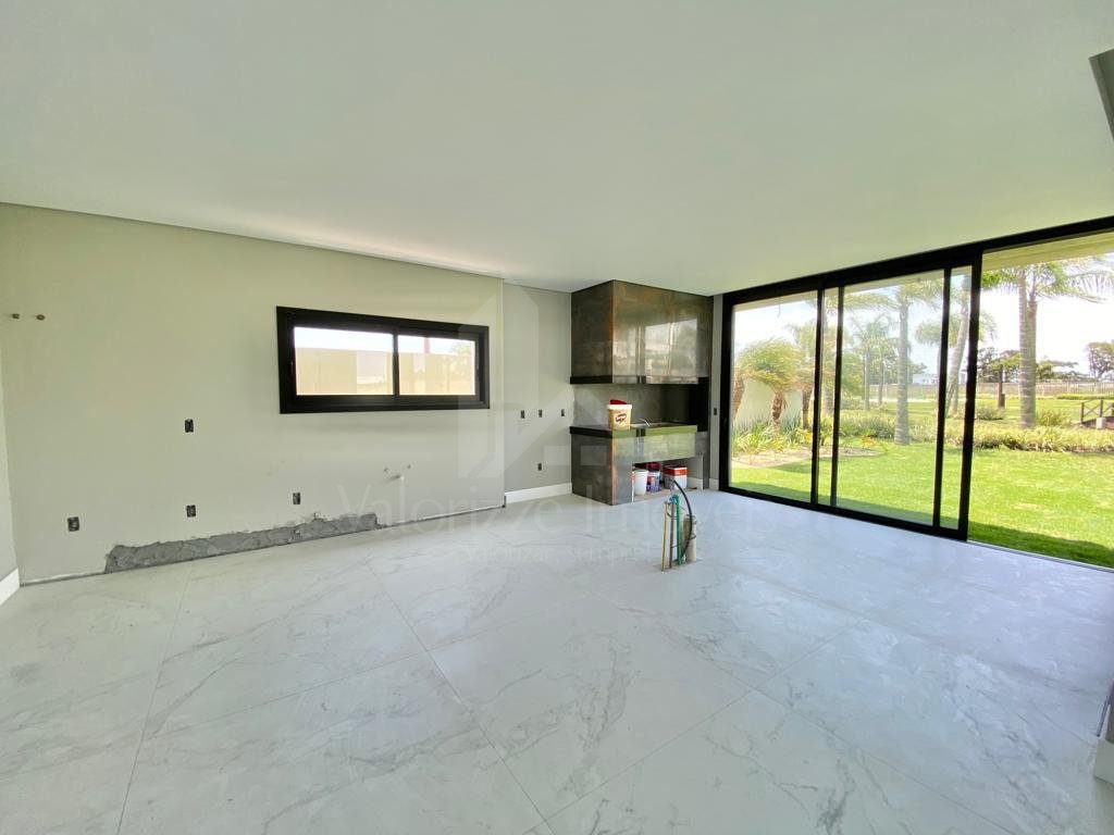 Casa em Condominio 5 dormitorios