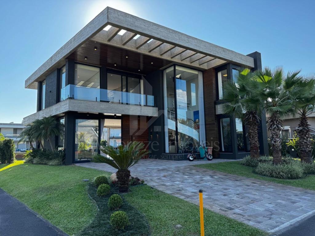 Casa em Condominio 5 dormitorios