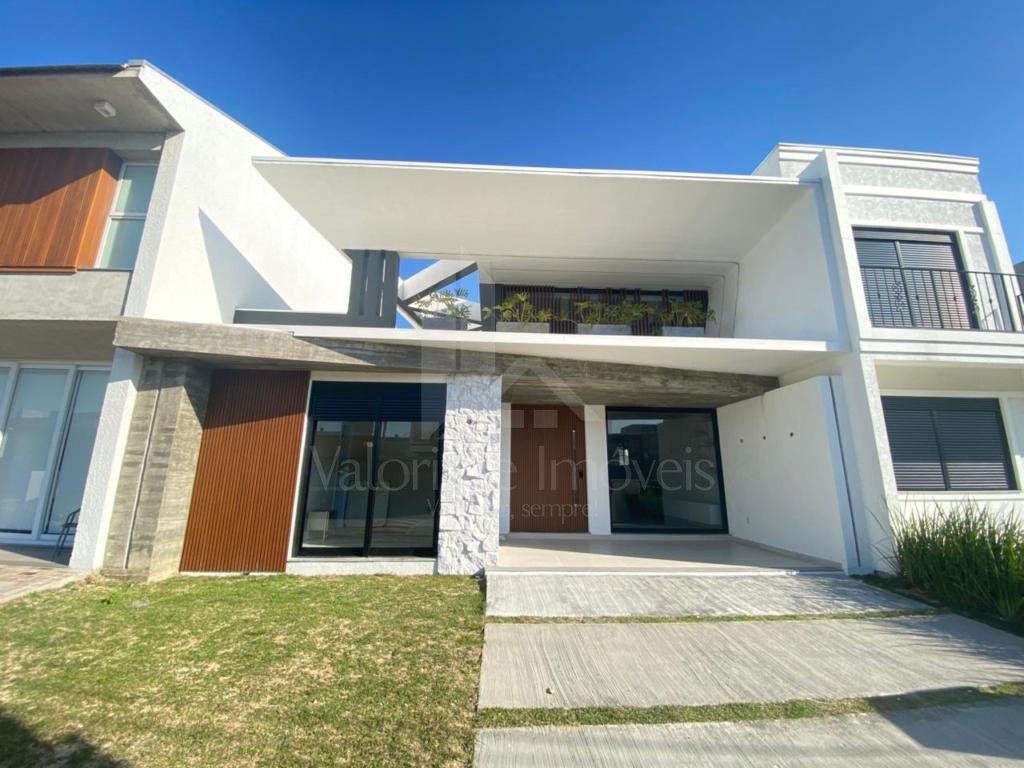 Casa em Condominio 4 dormitorios