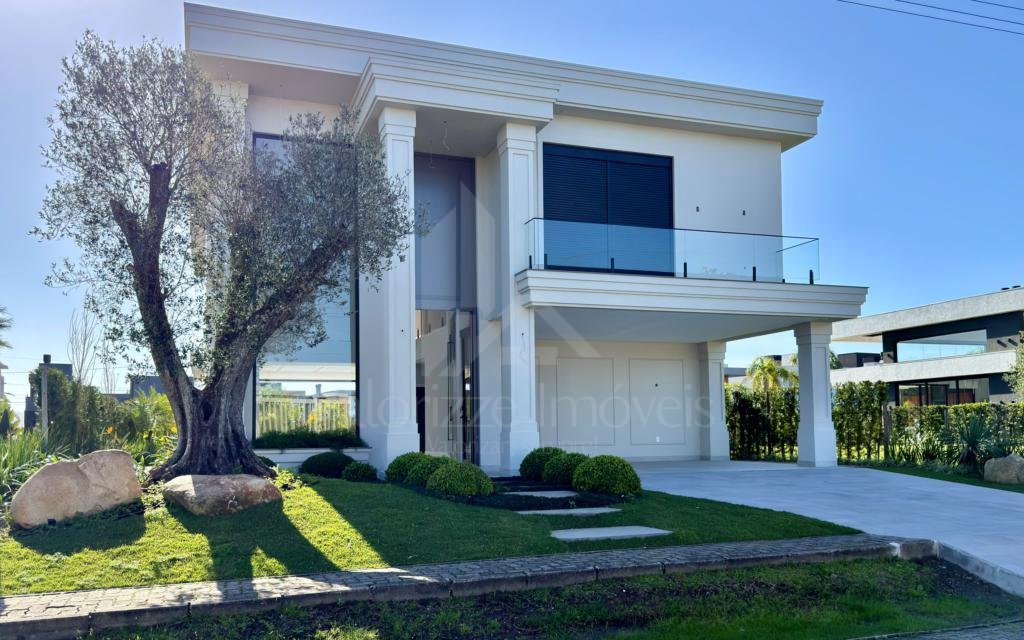 Casa em Condominio 5 dormitorios