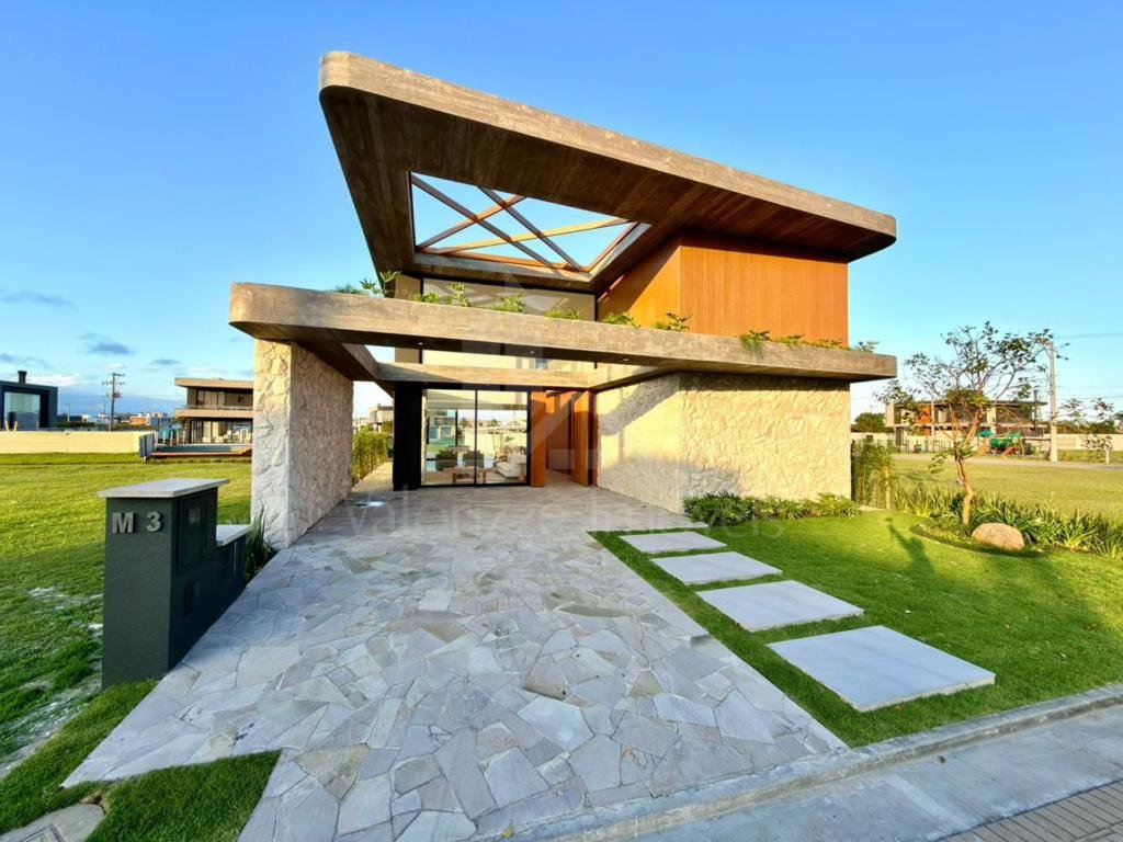 Casa em Condominio 5 dormitorios