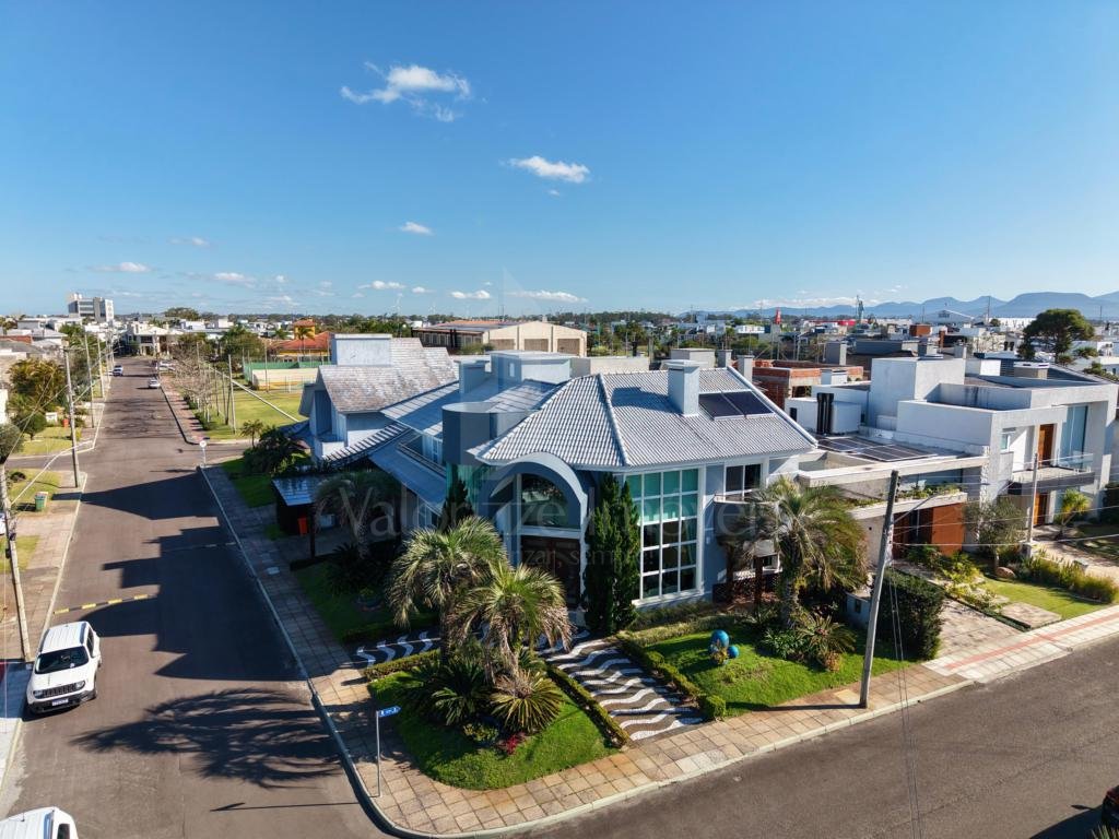 Casa em Condominio 4 dormitorios