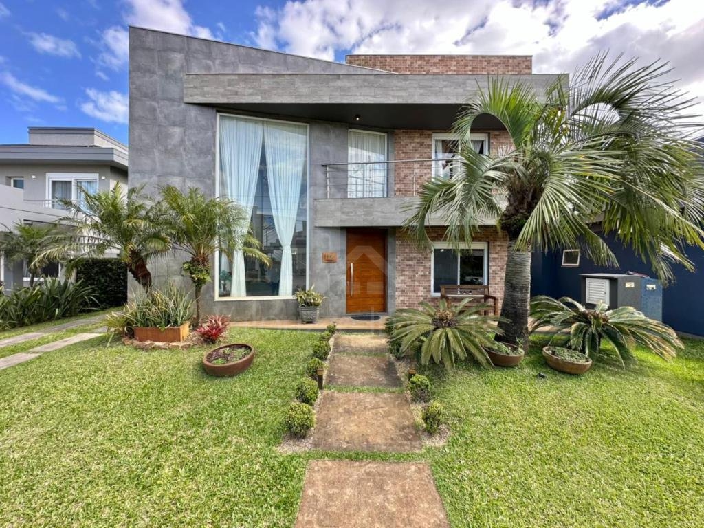 Casa em Condominio 5 dormitorios