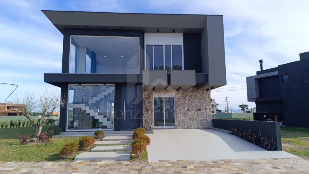 Casa em Condominio 4 dormitorios