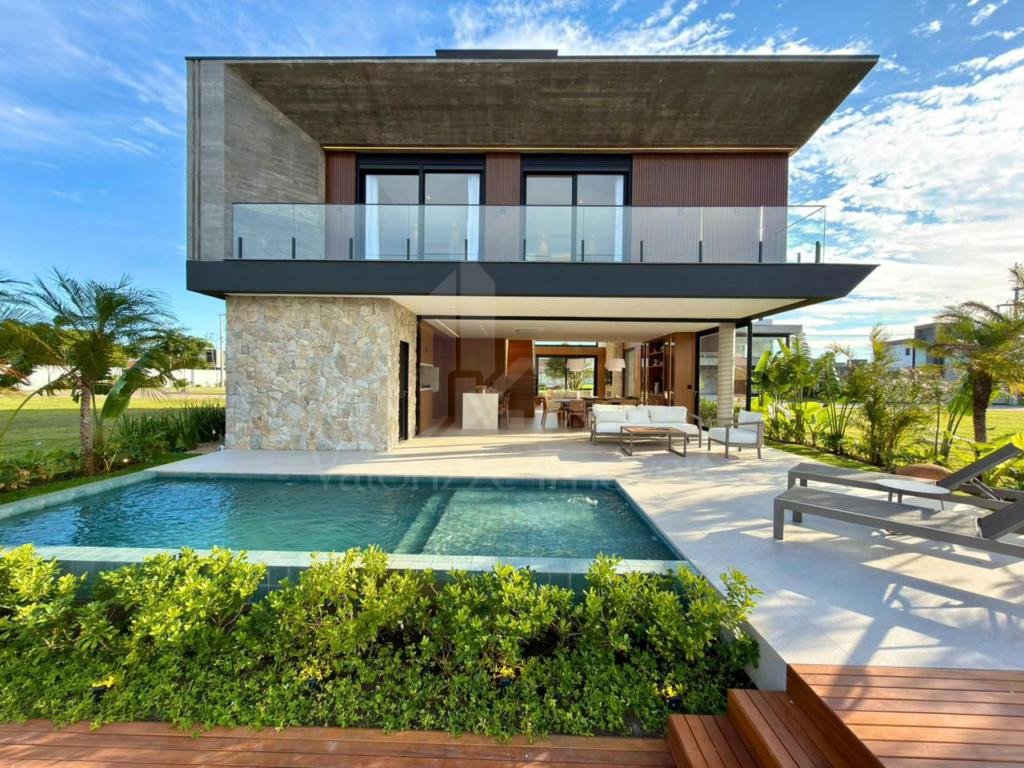 Casa em Condominio 5 dormitorios