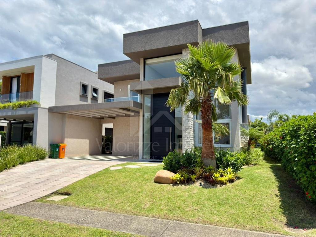 Casa em Condominio 4 dormitorios
