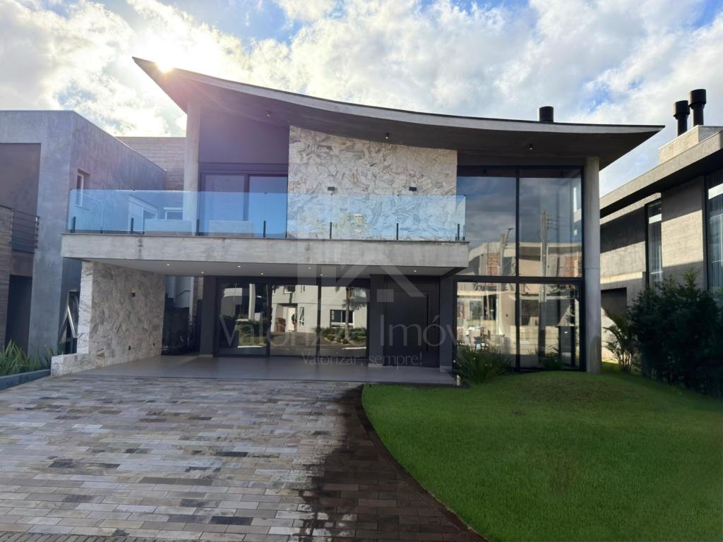 Casa em Condominio 5 dormitorios