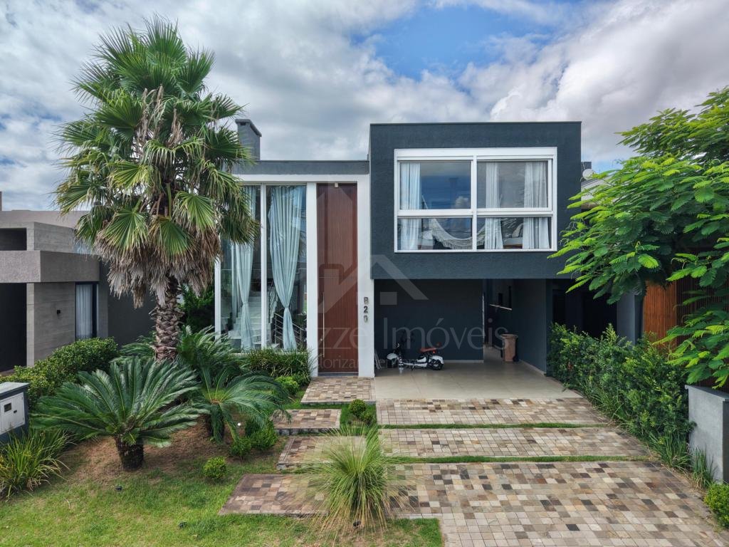 Casa em Condominio 5 dormitorios