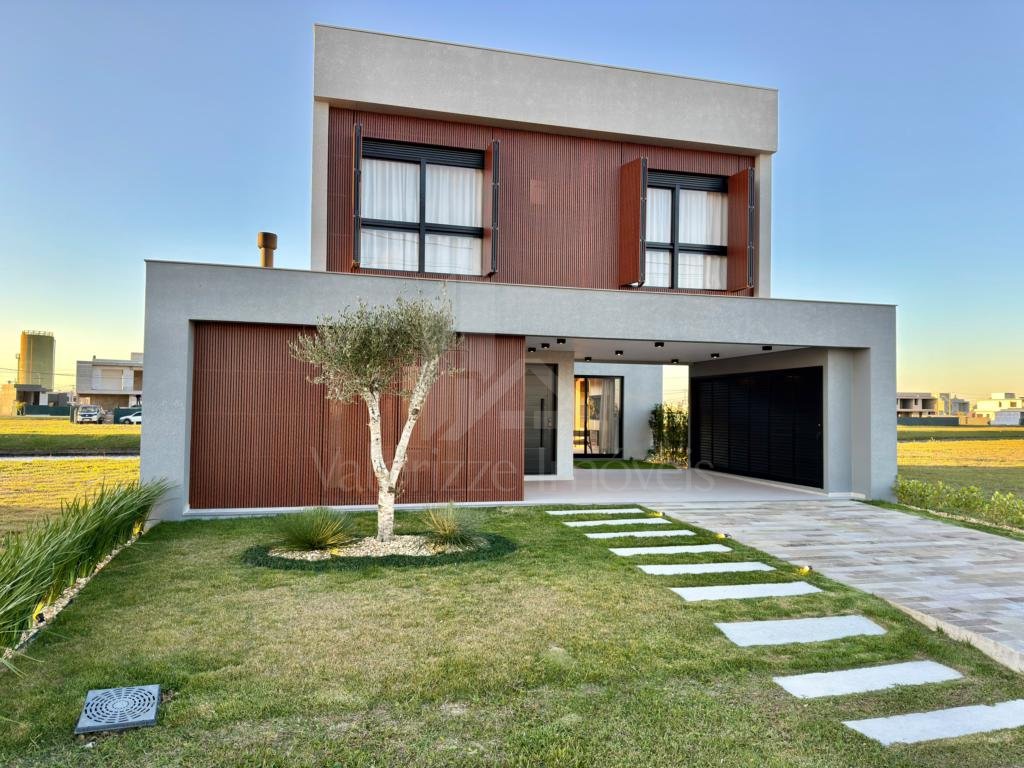 Casa em Condominio 4 dormitorios
