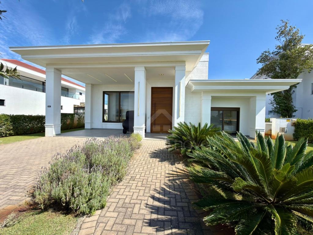 Casa em Condominio 4 dormitorios