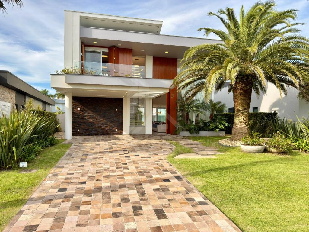 Casa em Condominio 5 dormitorios