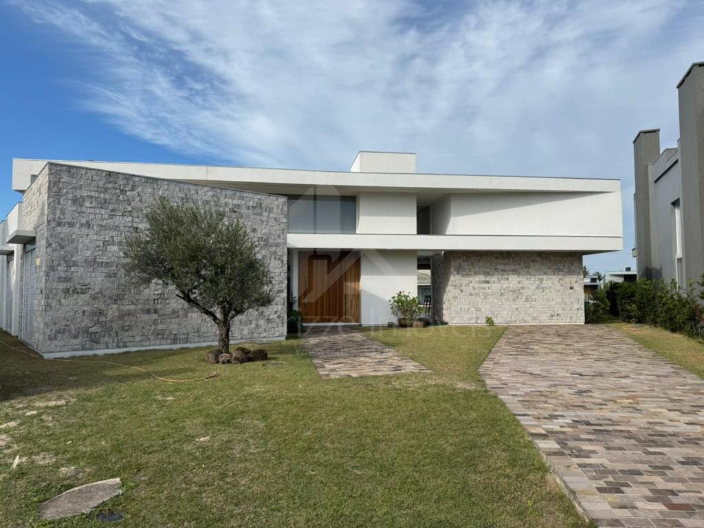 Casa em Condominio 4 dormitorios