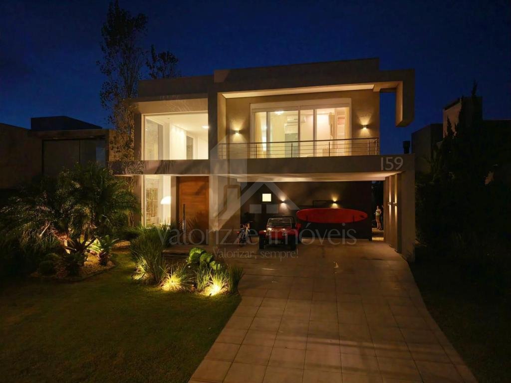 Casa em Condominio 5 dormitorios