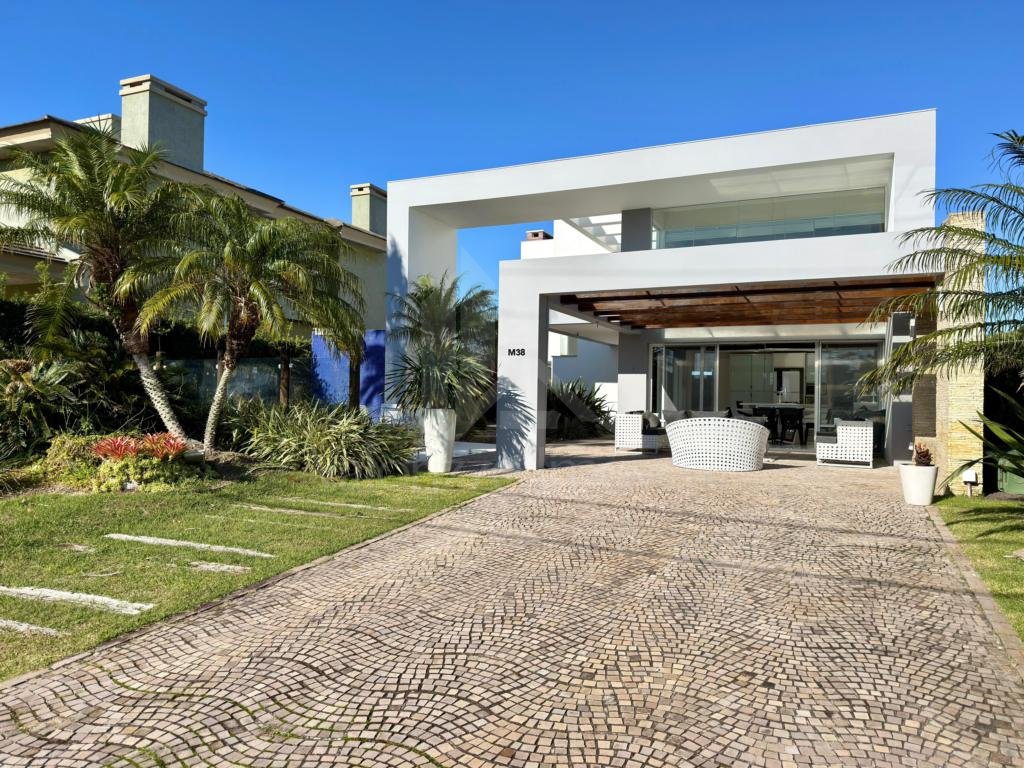 Casa em Condominio 4 dormitorios