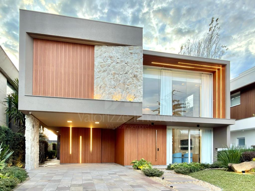 Casa em Condominio 5 dormitorios