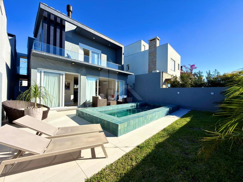 Casa em Condominio 4 dormitorios