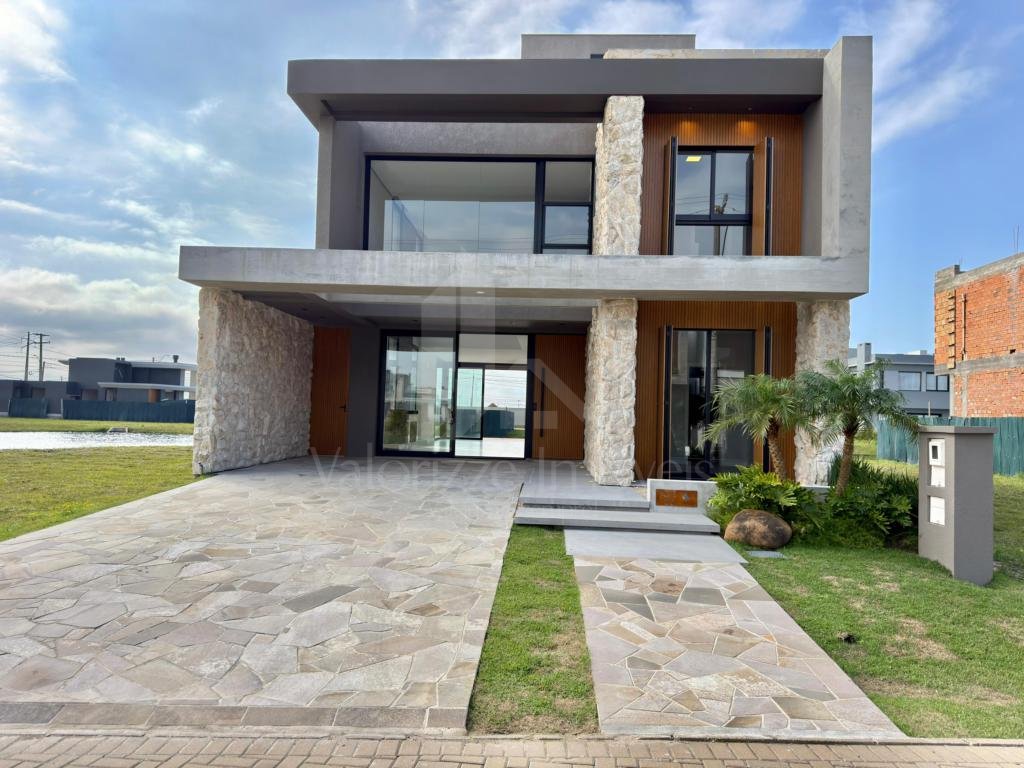 Casa em Condominio 4 dormitorios