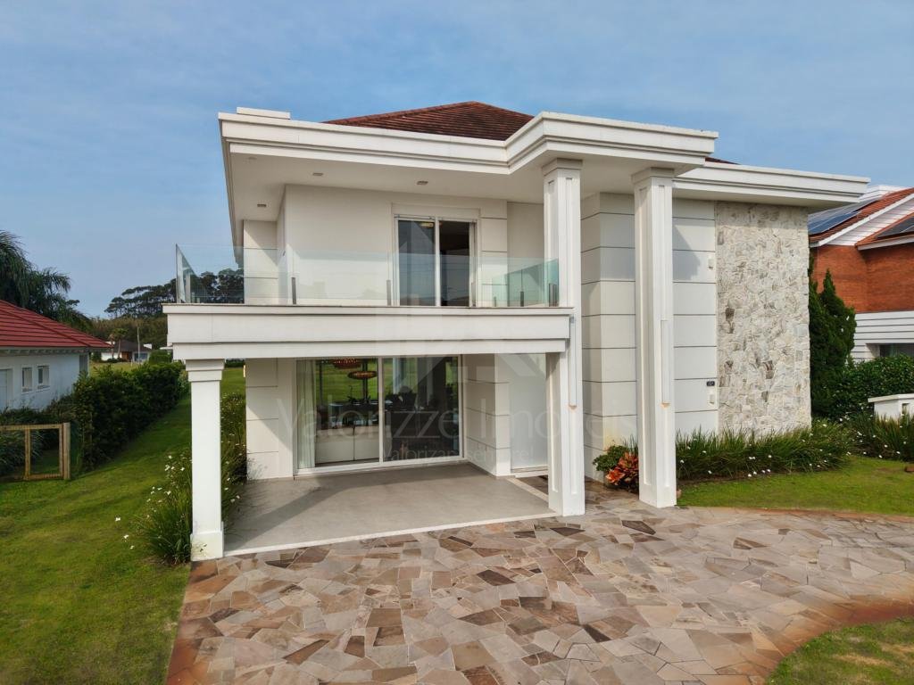 Casa em Condominio 5 dormitorios