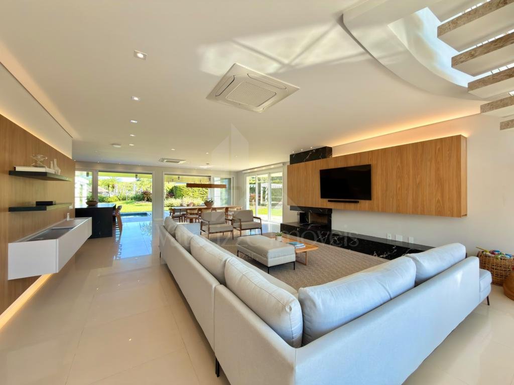 Casa em Condominio 5 dormitorios